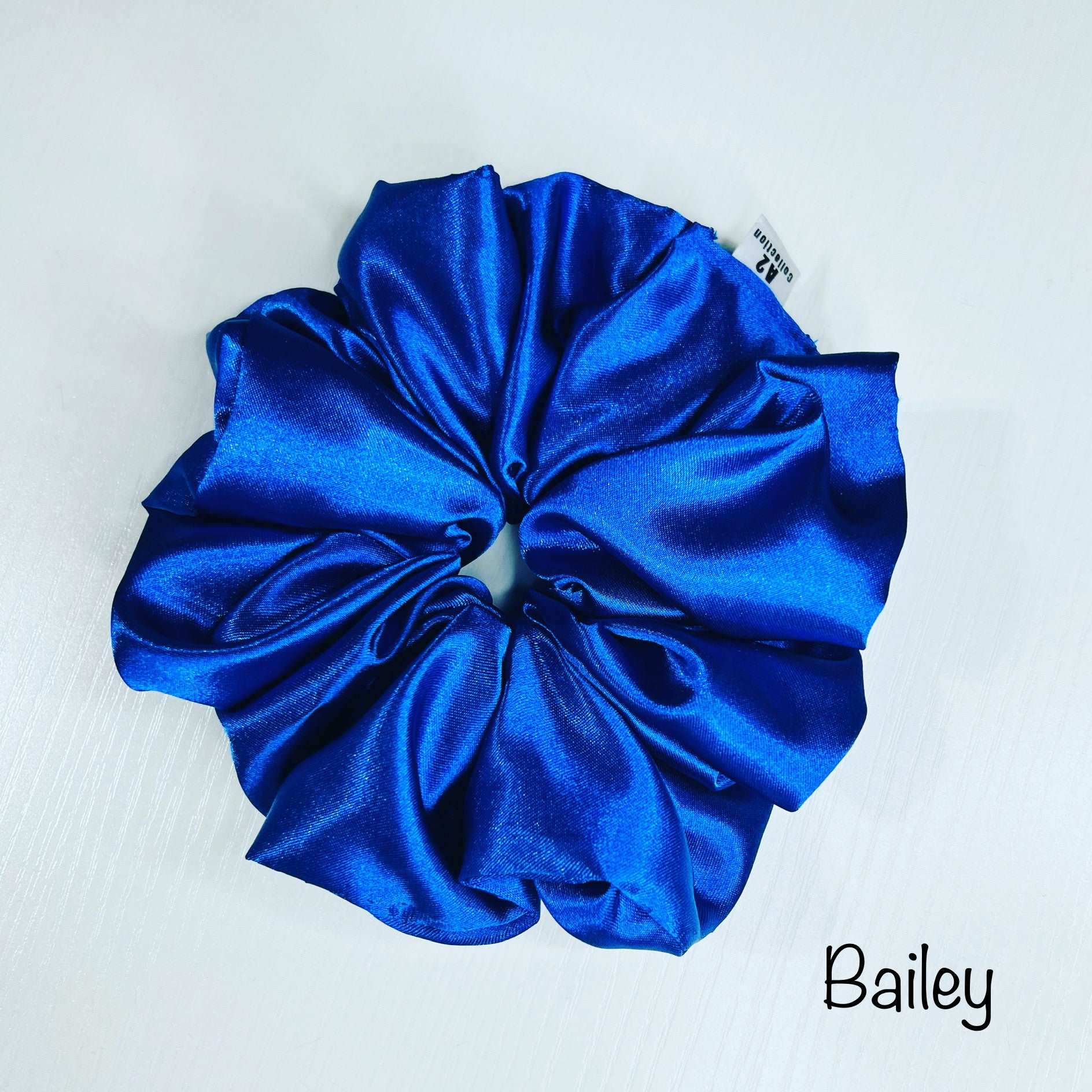 Introducing a touch of elegance to your hair game – our scrunchies, lovingly handcrafted from luxurious satin silk fabric. These scrunchies offer a blend of sophistication and comfort, effortlessly adding a touch of glamour to any hairstyle