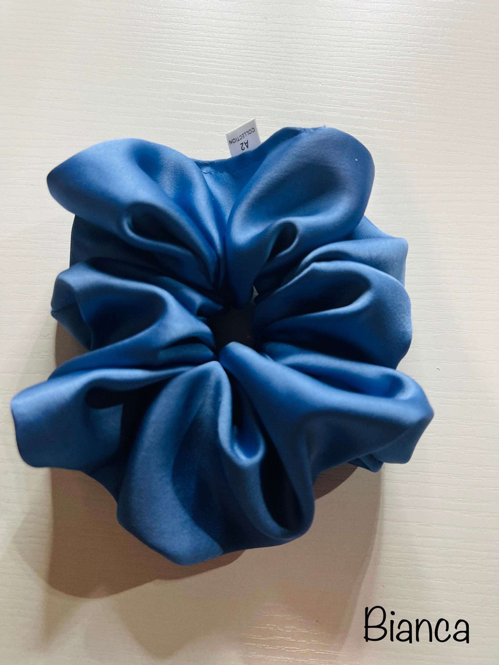 Made from buttery poly-satin, Bianca is your everyday go to scrunchie.